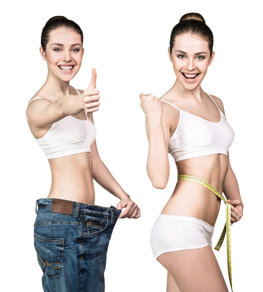 Woman in oversize jeans and with measuring tape.