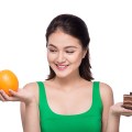 Diet. Dieting concept. Healthy Food. Beautiful Young Asian Woman
