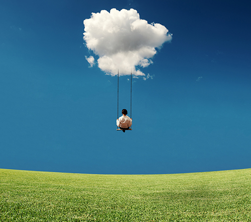 Businesswoman on a swing