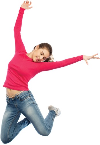 happy young woman jumping in air or dancing