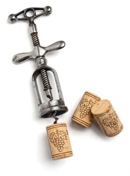 vintage corkscrew with corks