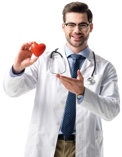 Smiling doctor wearing white coat with stethoscope and holding t
