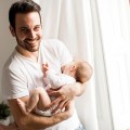 Father and newborn baby